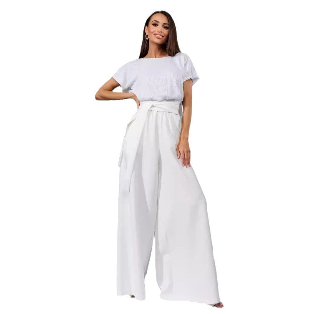 Dame Glitrende Jumpsuit med bredt ben og taljebælte Stilla