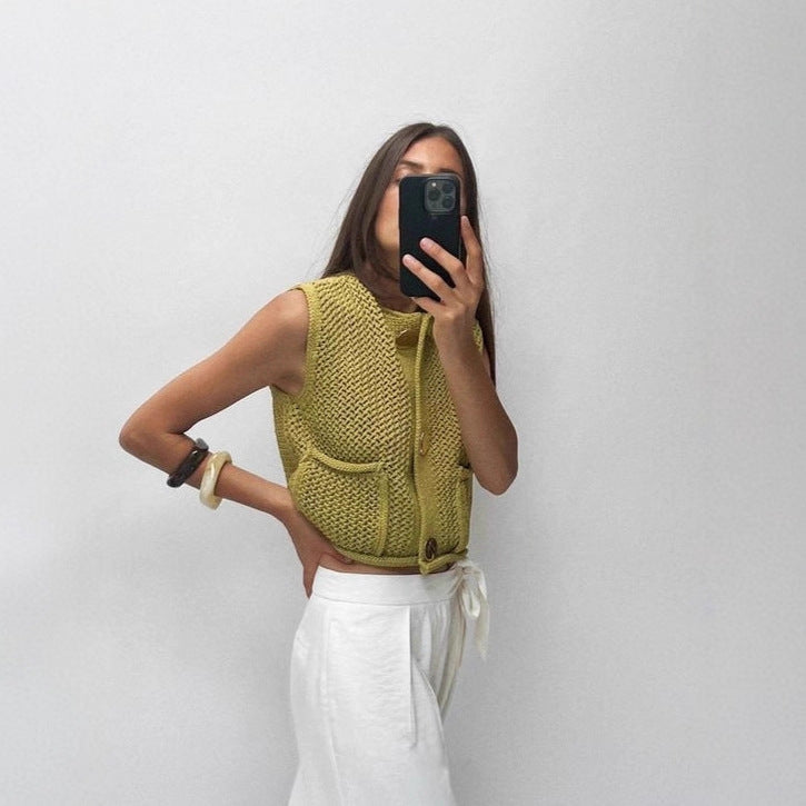 Dame strikvest med gennembrudt struktur og praktiske lommer Stilla