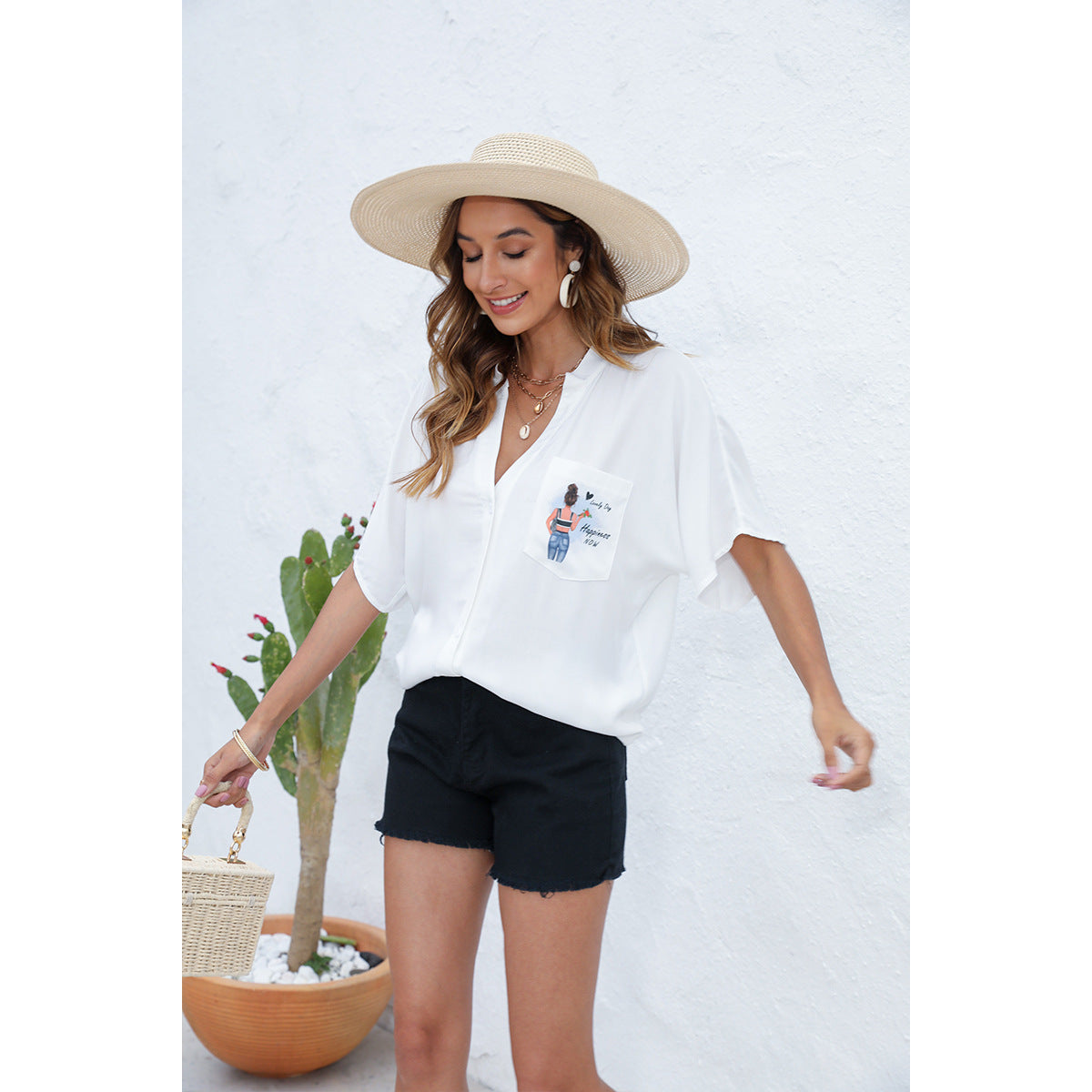 Dame afslappet bluse med dekorativ brysttryk Stilla