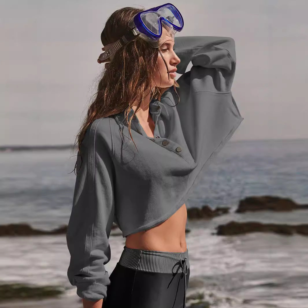 Dame afslappet cropped sweatshirt med knaplukning og sporty design Stilla