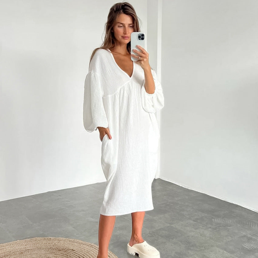 Dame afslappet midi-kjole med dyb V-udskæring og ballonformede ærmer Stilla