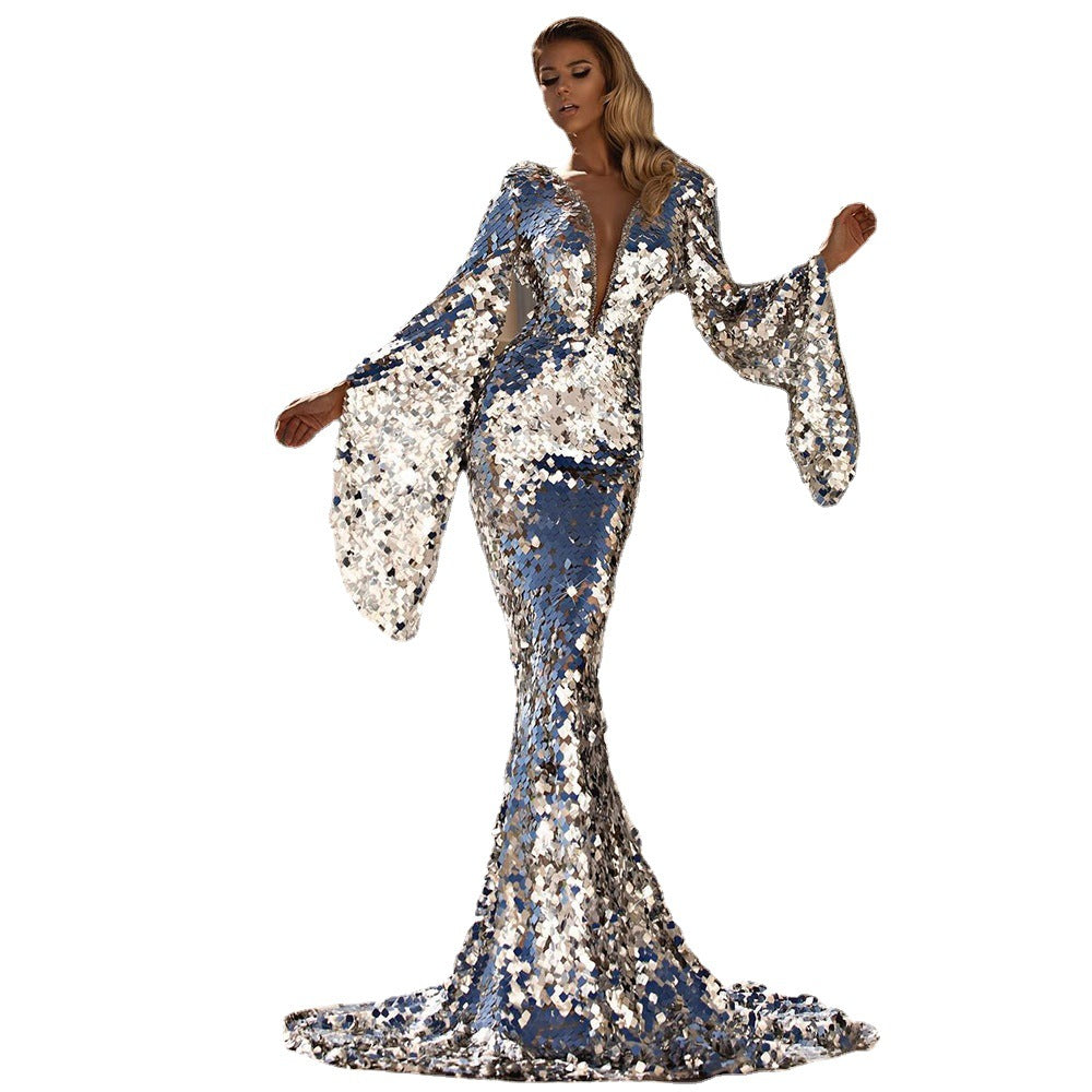 Dame Elegant aftenkjole med skimrende paljetter og dramatiske ærmer Stilla