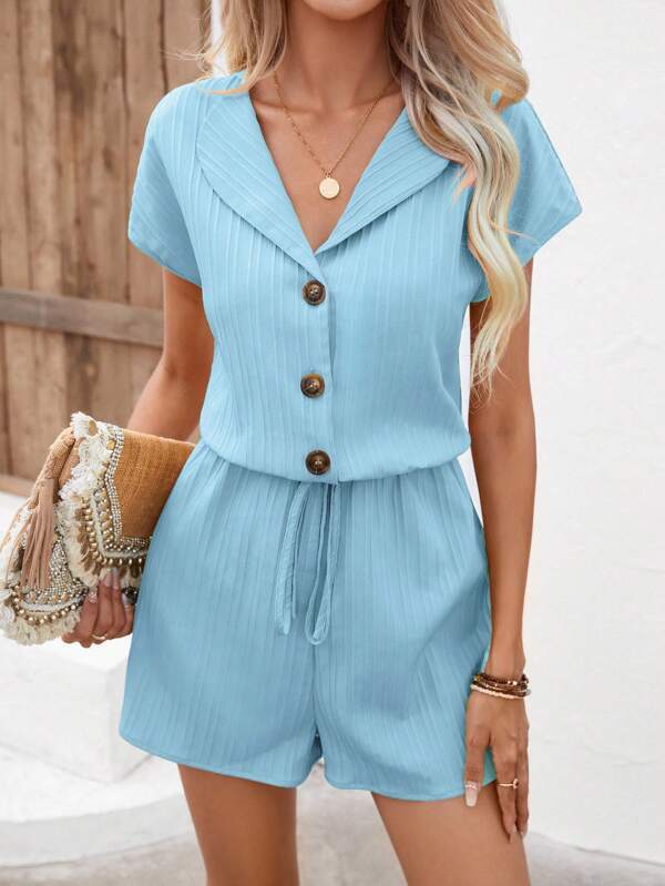 Dame jumpsuit med elegant snit og modiske knapdetaljer Stilla