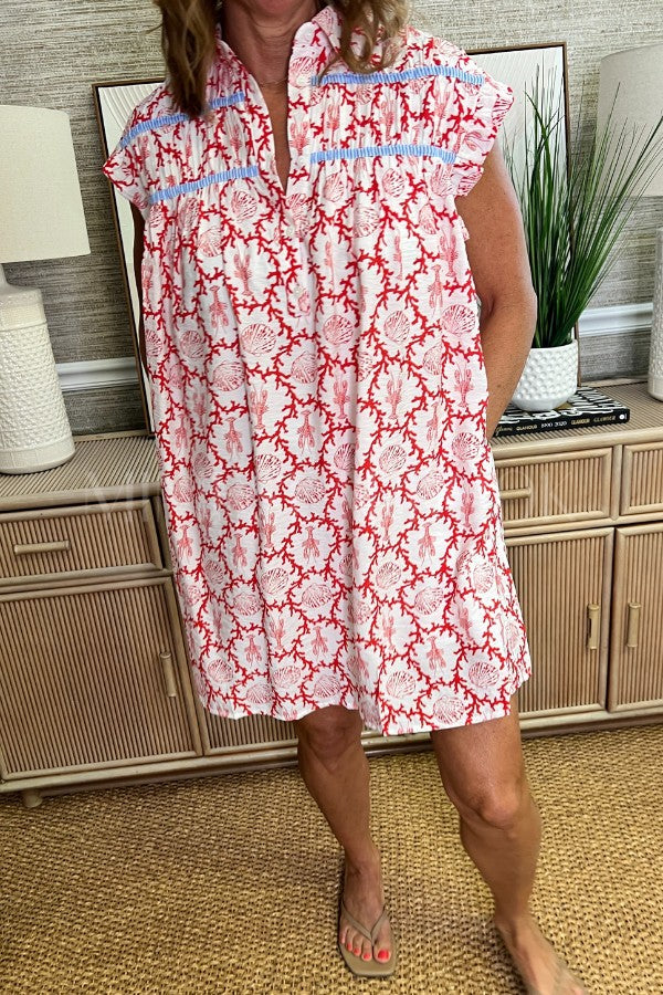 Dame afslappet strandkjole med blomsterdesign og knapfrit design Stilla