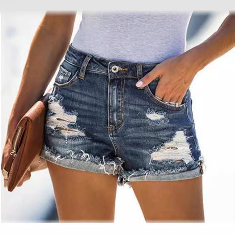 Dame Destroyed Denim-Shorts i Vintage-look med frynset kant og høj talje Stilla
