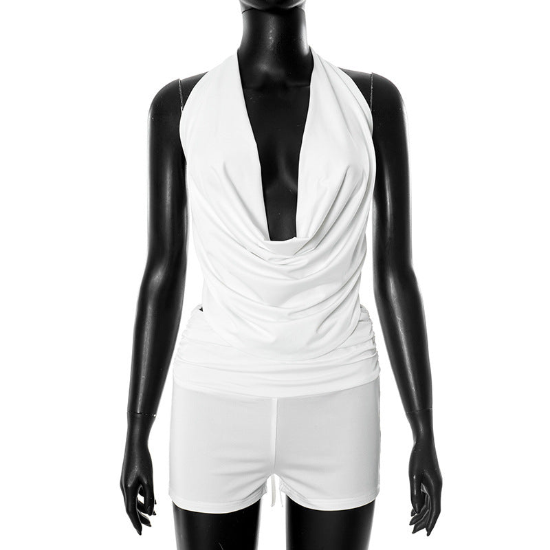 Dame strammesløse jumpsuit med dyb udskæring og flydende materiale Stilla