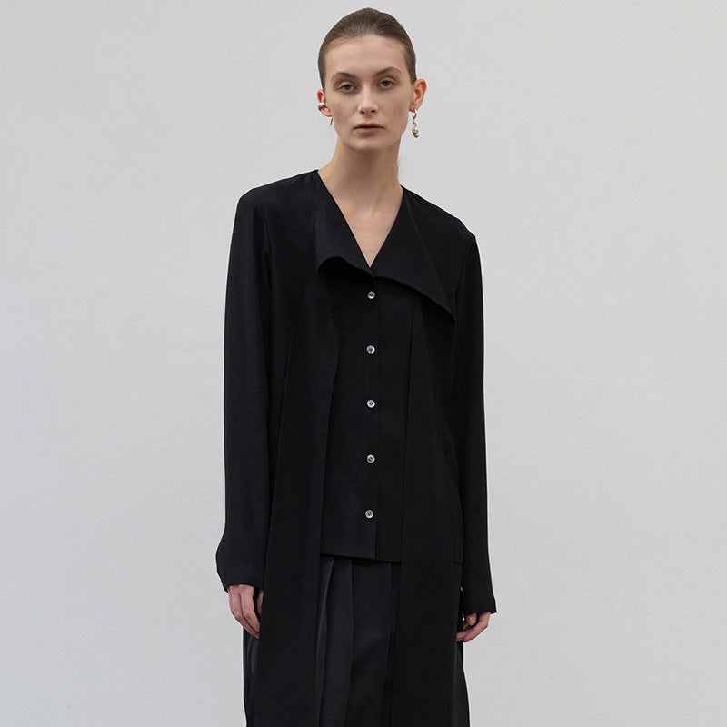 Dame elegant bluse med asymmetrisk snit og kvalitets knapdetaljer Stilla