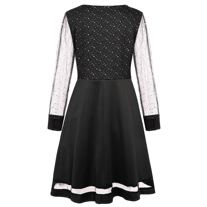 Dame elegant glitrende mini-kjole med gennemsigtige lange ærmer Stilla