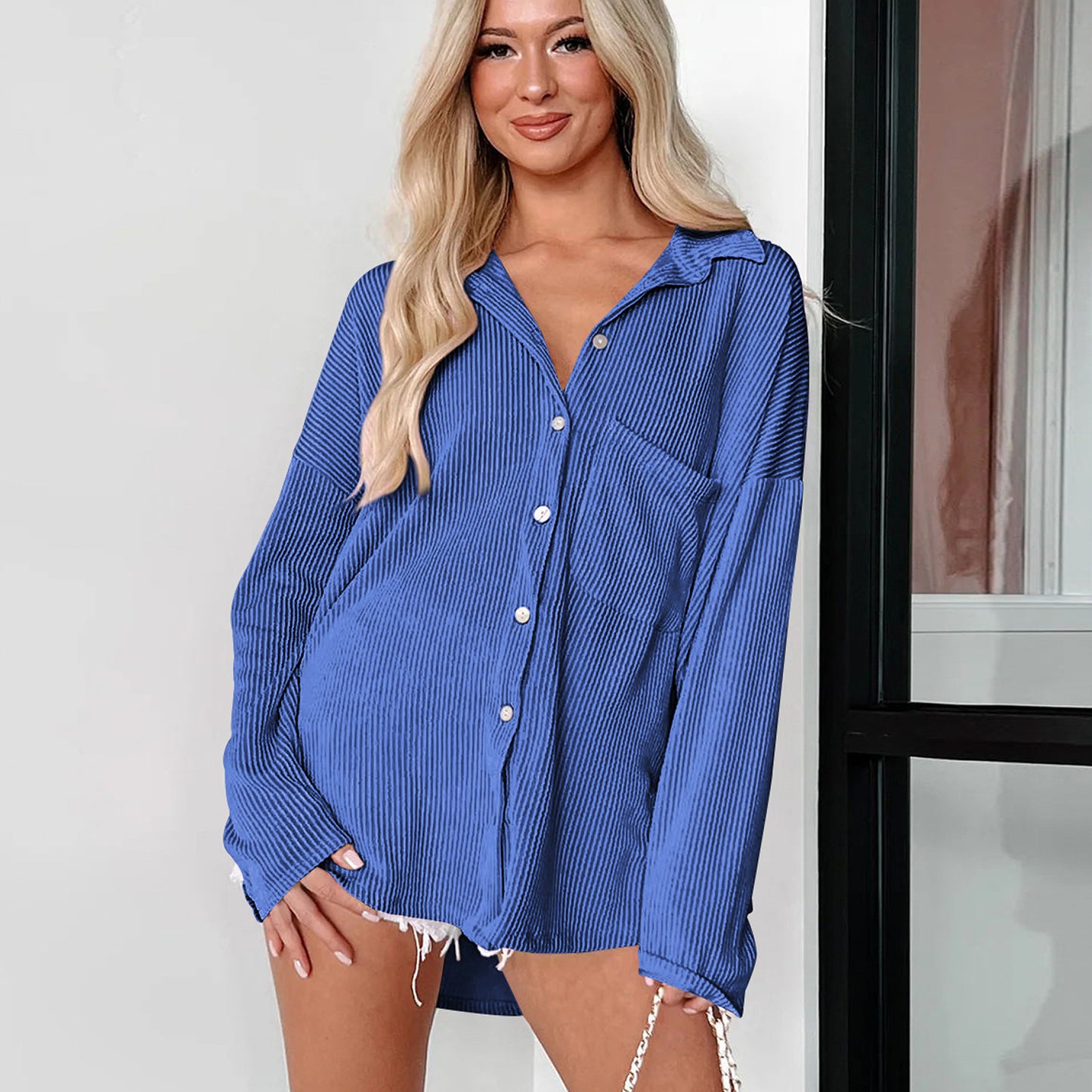 Dame afslappet langærmet bluse med struktureret design og praktisk brystlomme Stilla