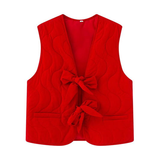 Dame quiltet vest med dekorativt bånd Stilla