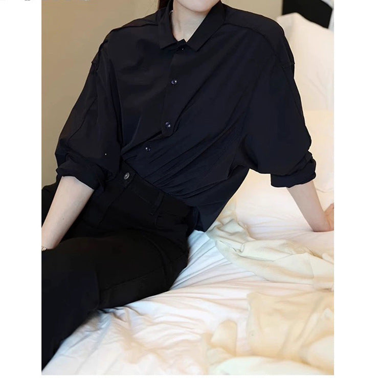 Dame afslappet bluse med ballonformet snit og elegant knaplukning Stilla