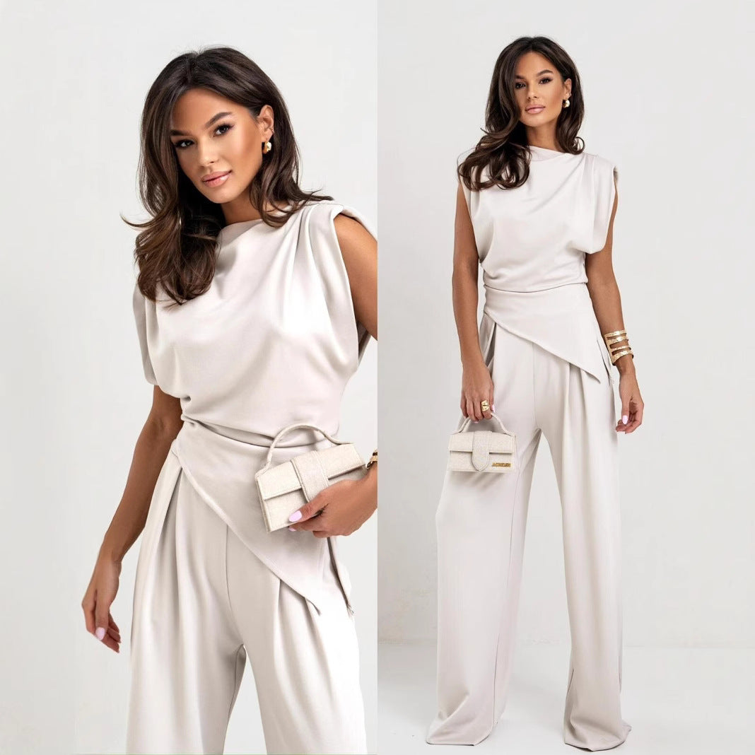 Dame elegant jumpsuit med asymmetrisk snit og flydende design Stilla