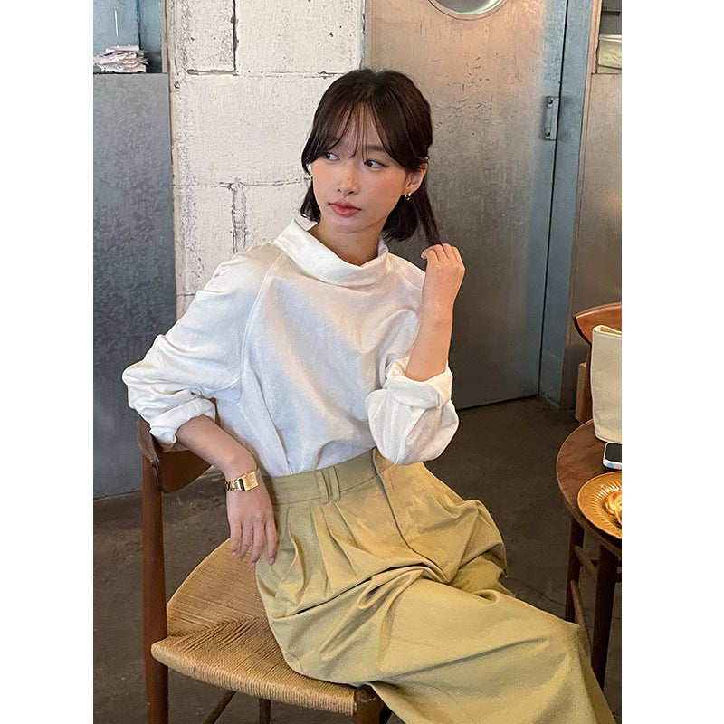 Dame afslappet langærmet skjorte med knapbare detaljer og fin struktur Stilla