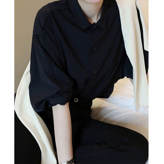 Dame afslappet bluse med ballonformet snit og elegant knaplukning Stilla