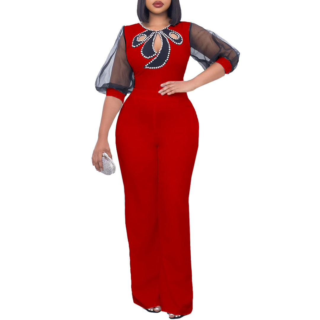 Dame Elegante Jumpsuit med gennemsigtige ærmer og smykker detaljer Stilla