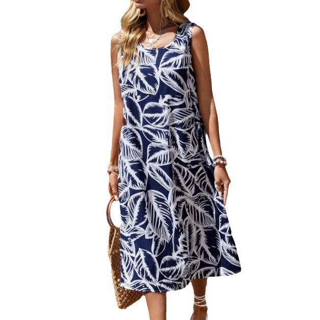 Dame afslappet strandkjole med blomsterdesign og sidelommer Stilla