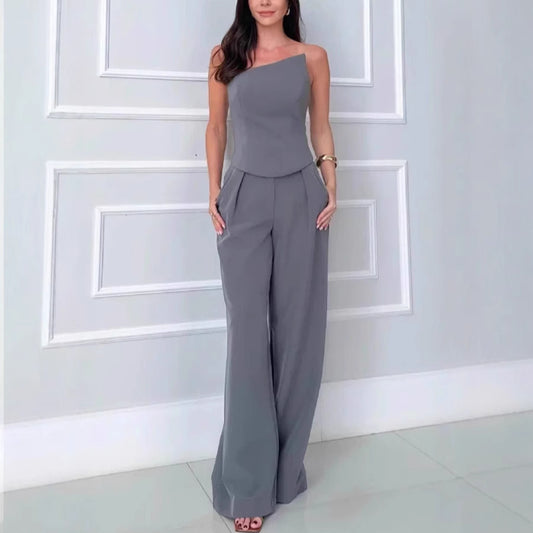 Dame Elegant jumpsuit med asymmetrisk skæring og bredt ben Stilla
