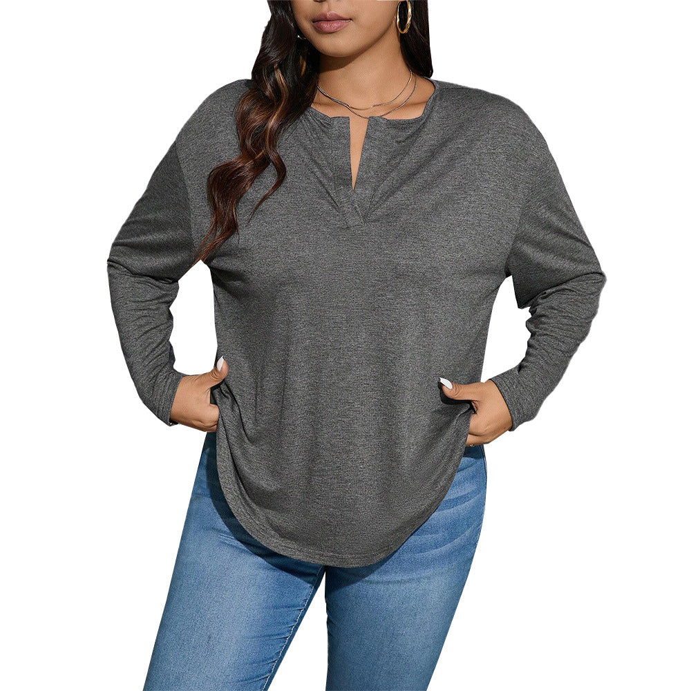 Dame afslappet longsleeve top med V-udskæring og let asymmetrisk kant Stilla