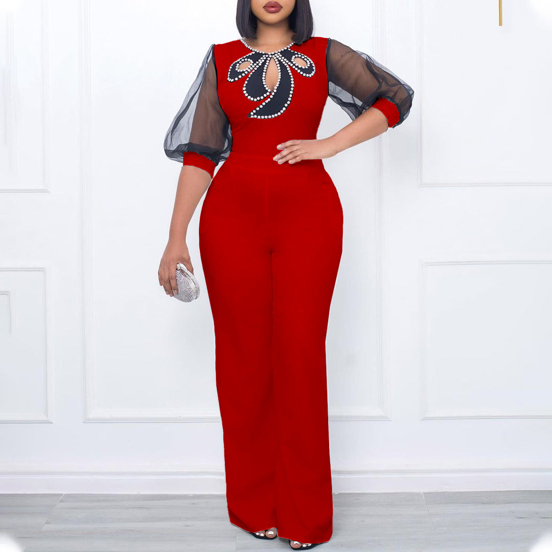 Dame Elegante Jumpsuit med gennemsigtige ærmer og smykker detaljer Stilla