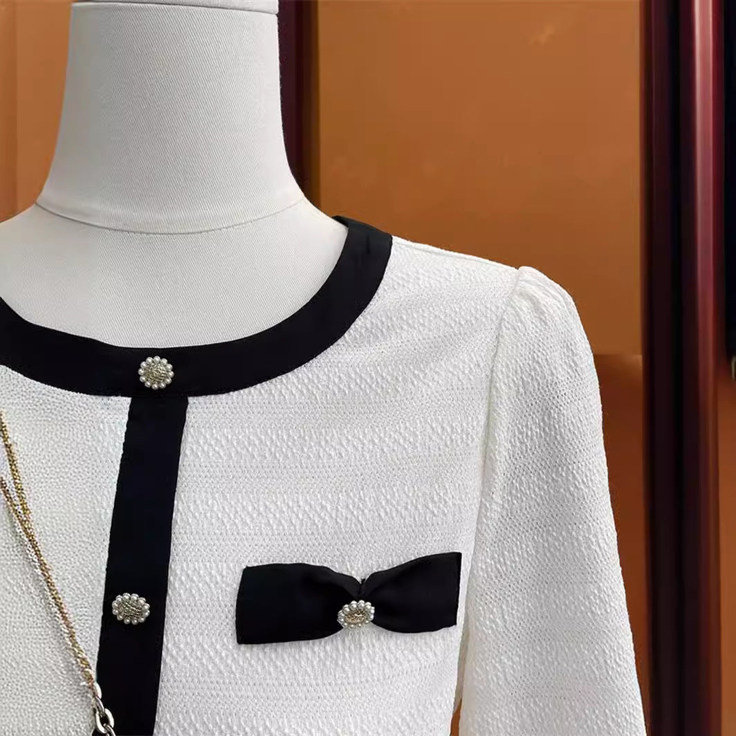 Dame elegant bluse med dekorative sløjfer og knapdetaljer Stilla