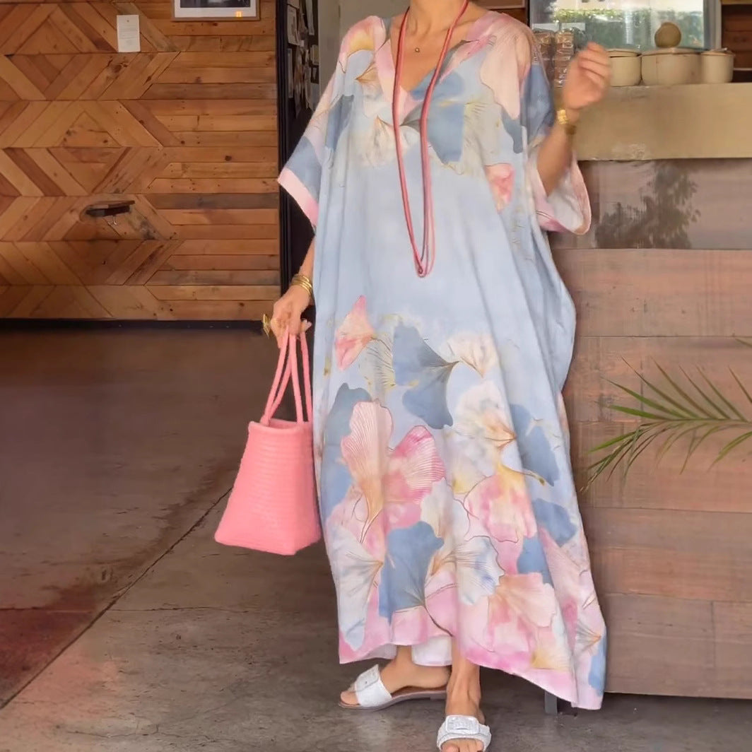 Dame Elegant kaftan-kjole med blomsterdesign og brede ærmer Stilla