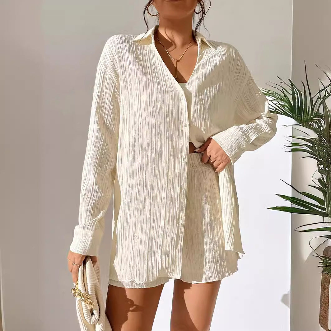 Dame afslappet kortærmet jumpsuit med struktureret overflade og elegant V-udskæring Stilla
