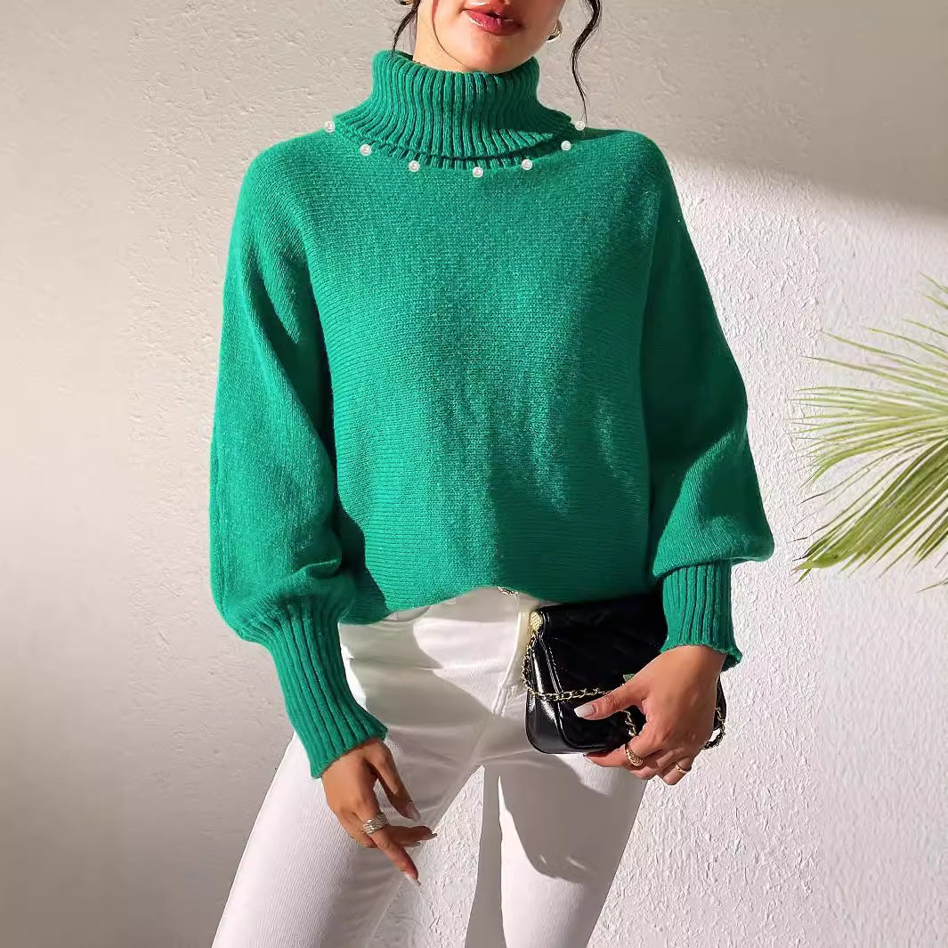 Dame afslappet rullekravepullover med dekorative perledetaljer og bred pasform Stilla