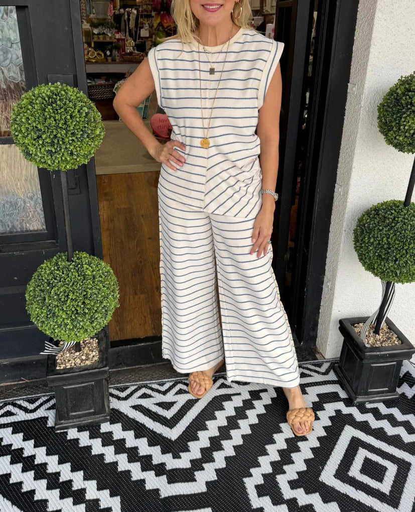 Dame stribet jumpsuit med bred ben og ærmeløst design Stilla