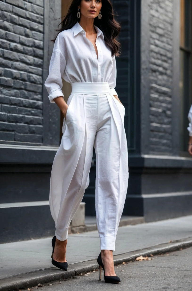 Dame elegant jumpsuit med fine plisseringer og smart krave Stilla