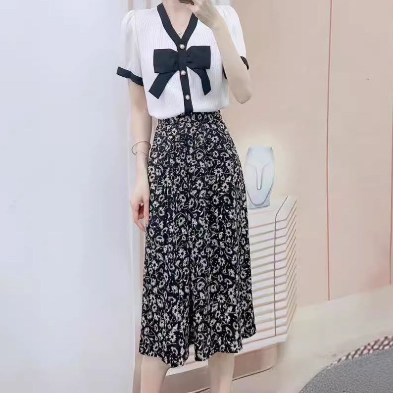 Dame Elegant Bluse med Sløjfeakcent og Blomsterprint Nederdel Stilla