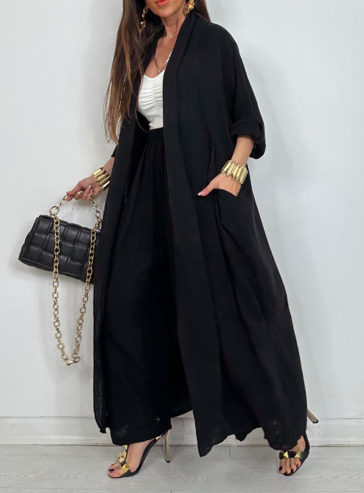 Dame afslappet lang frakke med vid snit og praktiske lommer Stilla