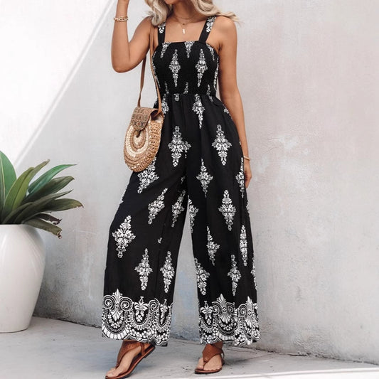 Dame luftig jumpsuit med blomstermønster og praktiske lommer Stilla