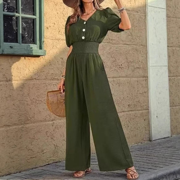 Dame jumpsuit med elastisk talje og knapdetalje Stilla