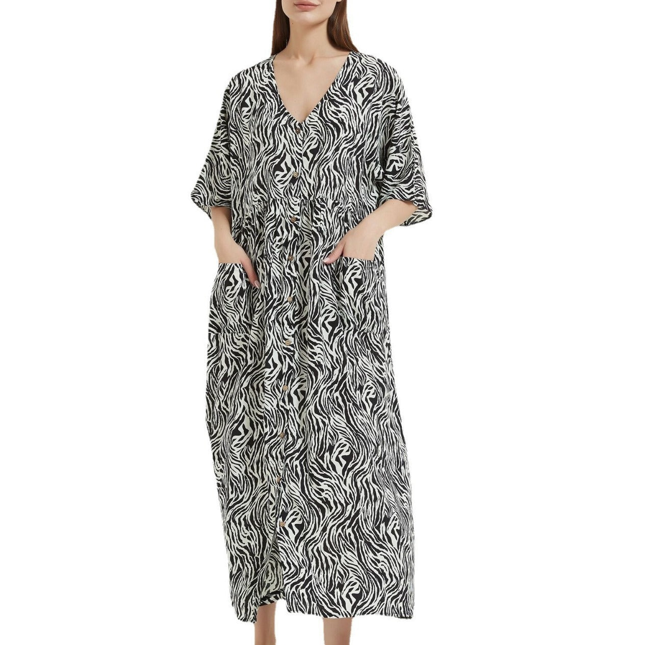 Dame afslappet maxikjole med dyb V-hals og sidelommer Stilla