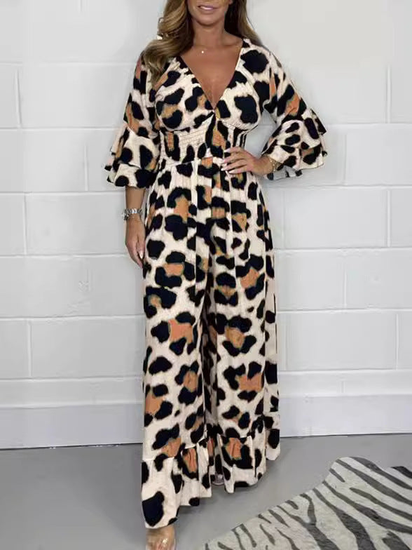 Dame Maxijumpsuit med elegant V-udskæring og flæseærmer Stilla