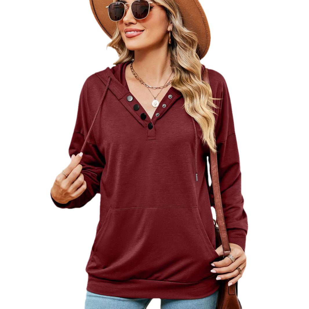 Dame afslappet hoodie med knapdetalje og kængurulomme Stilla