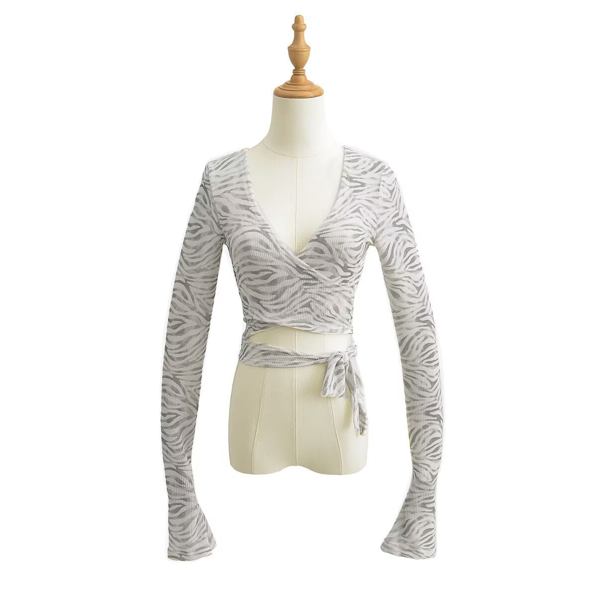 Dame cropped langærmet top med raffineret knude-design og elastisk stof Stilla