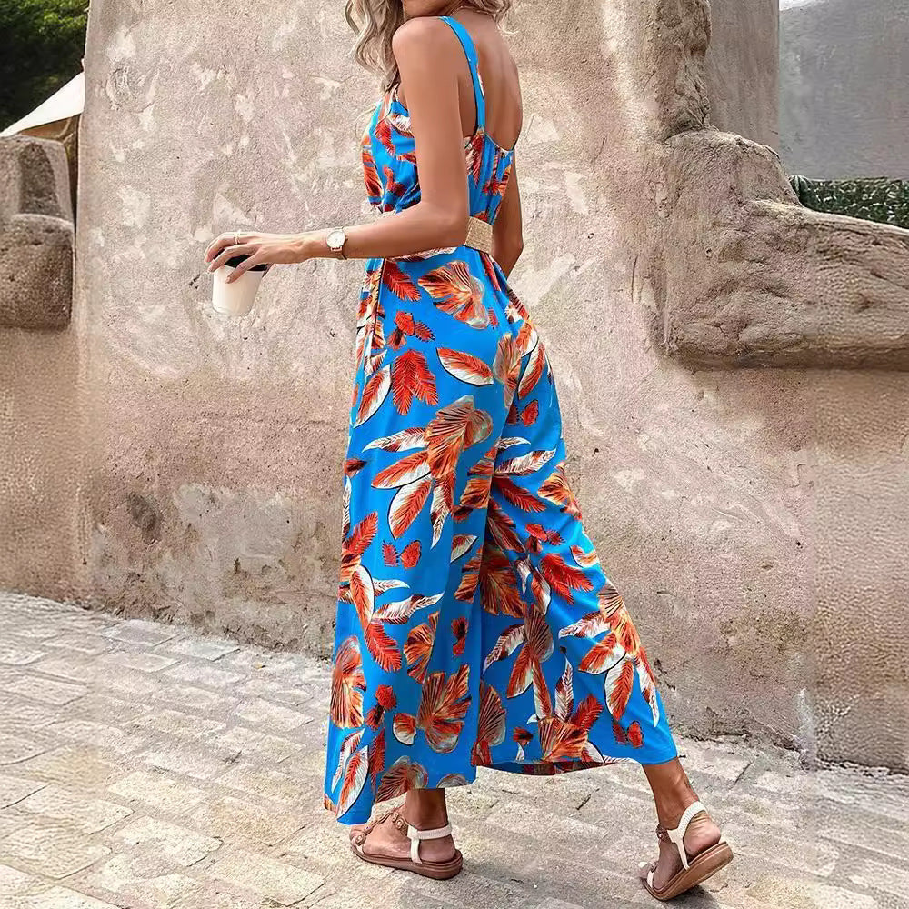 Dame jumpsuit med blomsterprint og bred ben Stilla