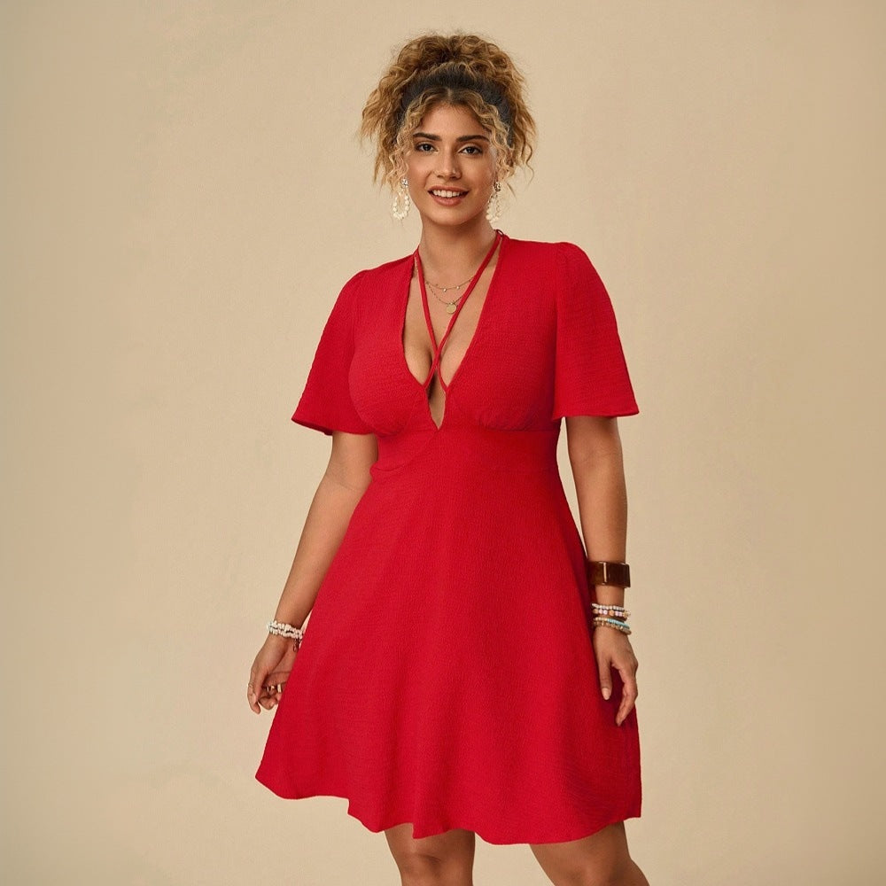 Dame afslappet minikjole med dyb V-udskæring og flydende skørt Stilla