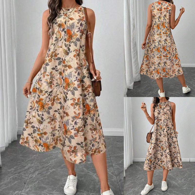 Dame afslappet blomsterkjole med lommer og svajende kant Stilla