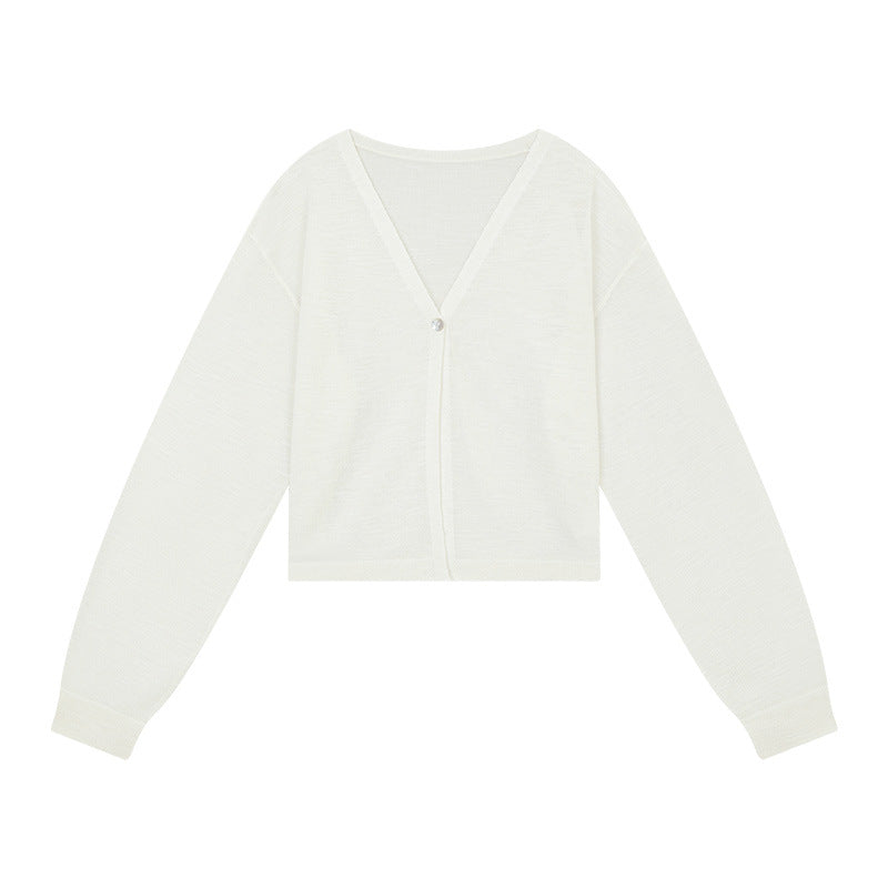 Dame cropped strikjakke med V-udskæring og knapdetaljer Stilla