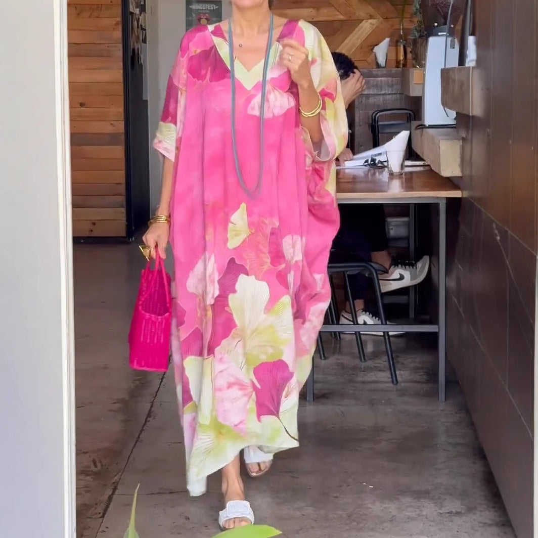 Dame Elegant kaftan-kjole med blomsterdesign og brede ærmer Stilla