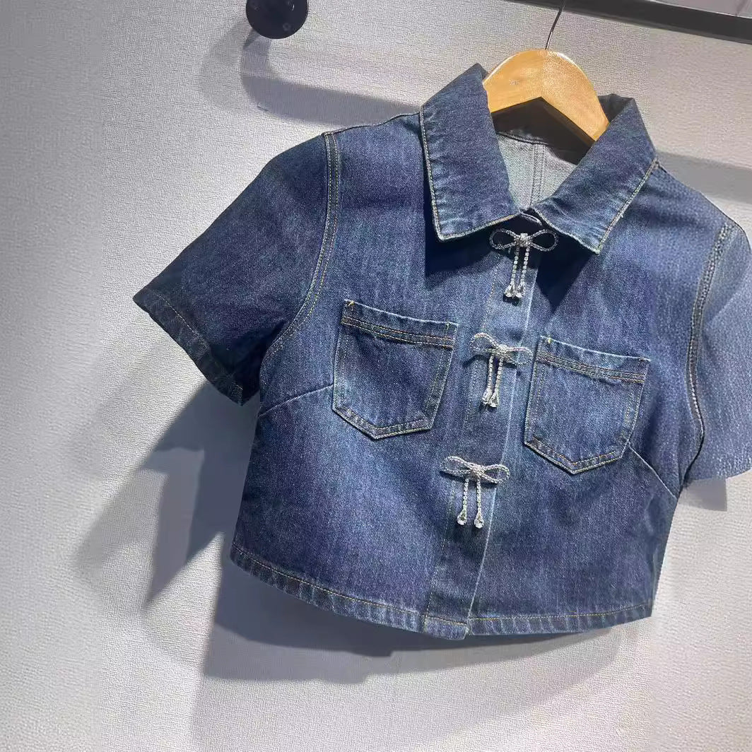 Dame Denim Mini Skirt med dekorative lommer og knaplukning Stilla