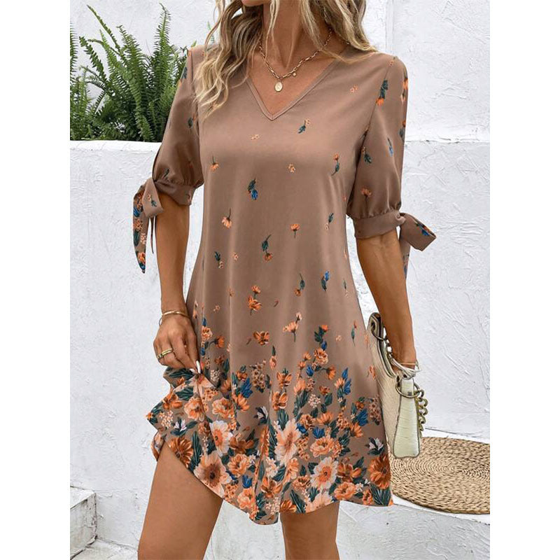 Dame afslappet blusekjole med floral design og loopærmer Stilla