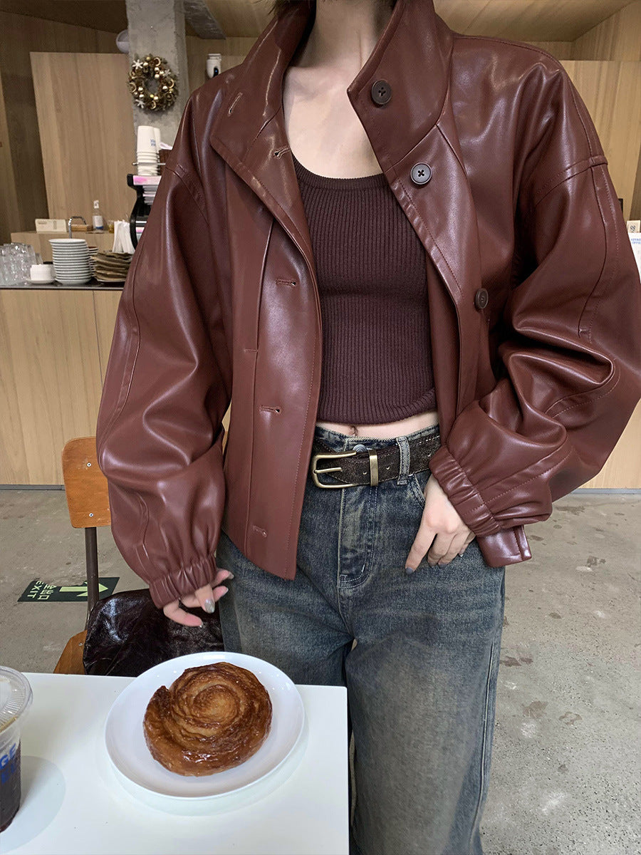 Dame afslappet kunstlæderjakke med høj krave og praktiske lommer Stilla