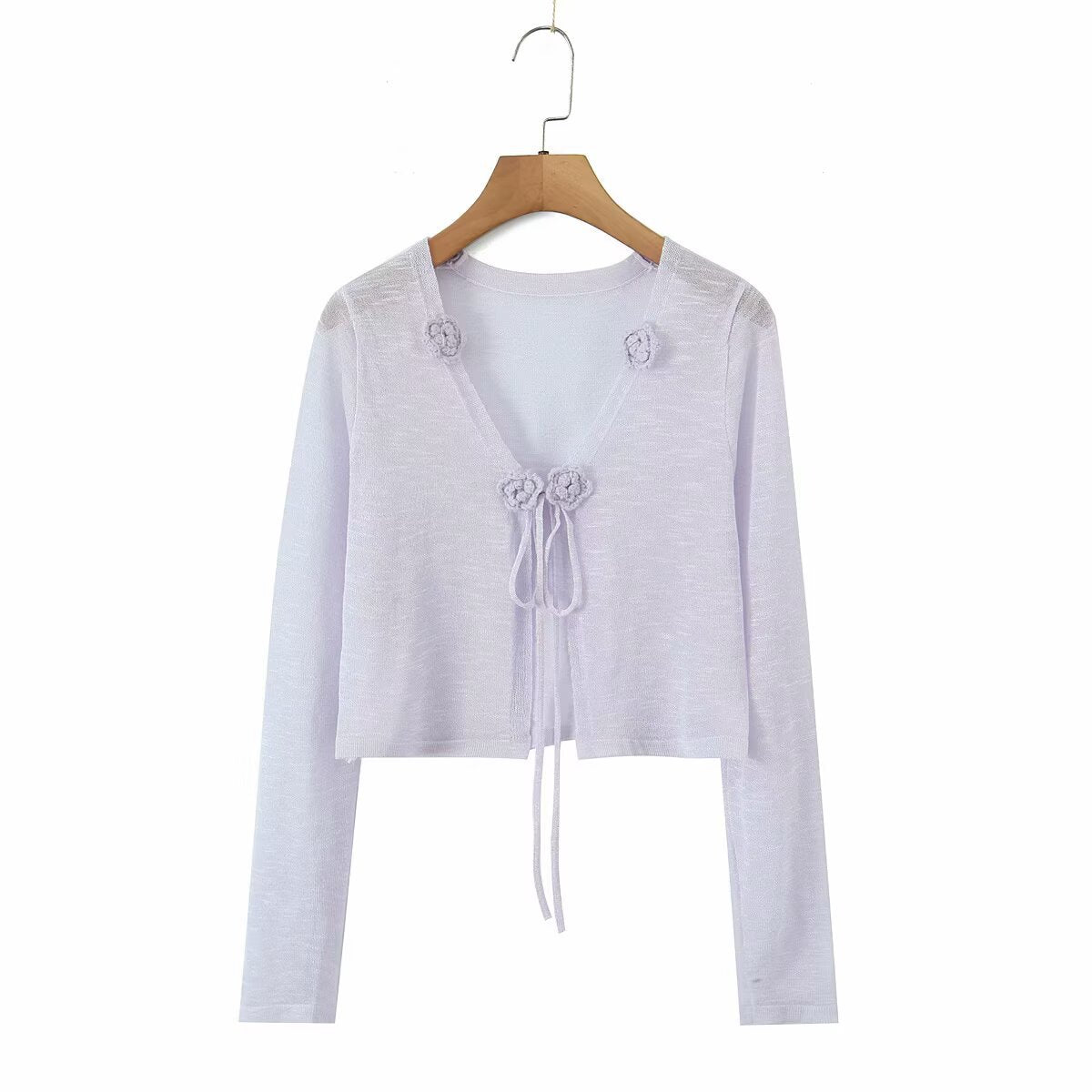 Dame cropped strikjakke med blomstrede accenter og elegant bindebånd Stilla