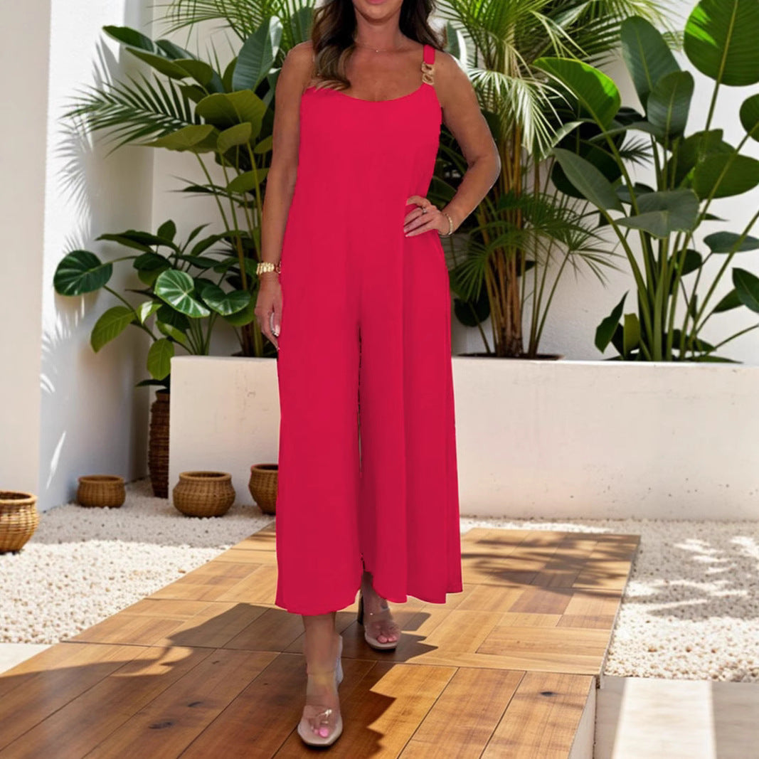 Dame luftig jumpsuit med smal pasform og modige accenter Stilla