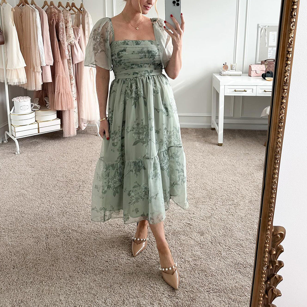 Dame Elegant blomsterkjole med gennemsigtige ærmer og taljering Stilla