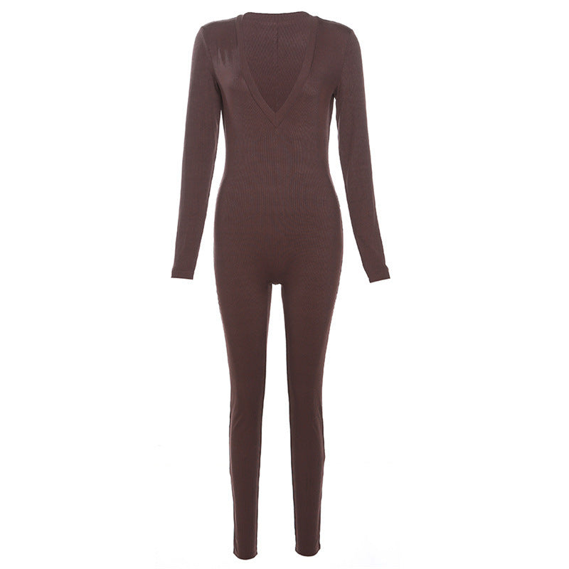 Dame figurtilpasset jumpsuit med dyb V-udskæring og lange ærmer Stilla