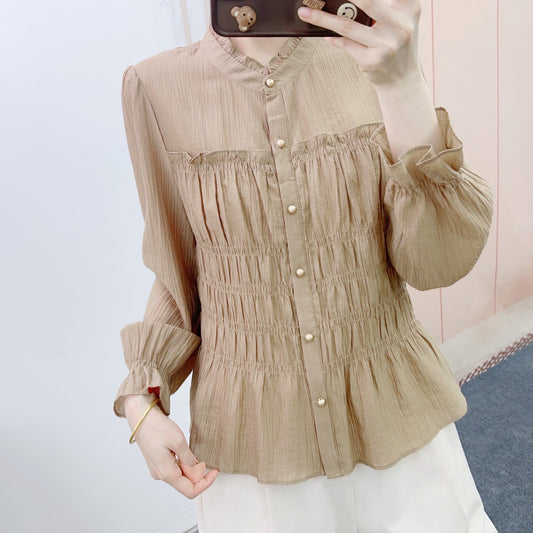 Dame elegant bluse med rynkedesign og knapdetaljer Stilla